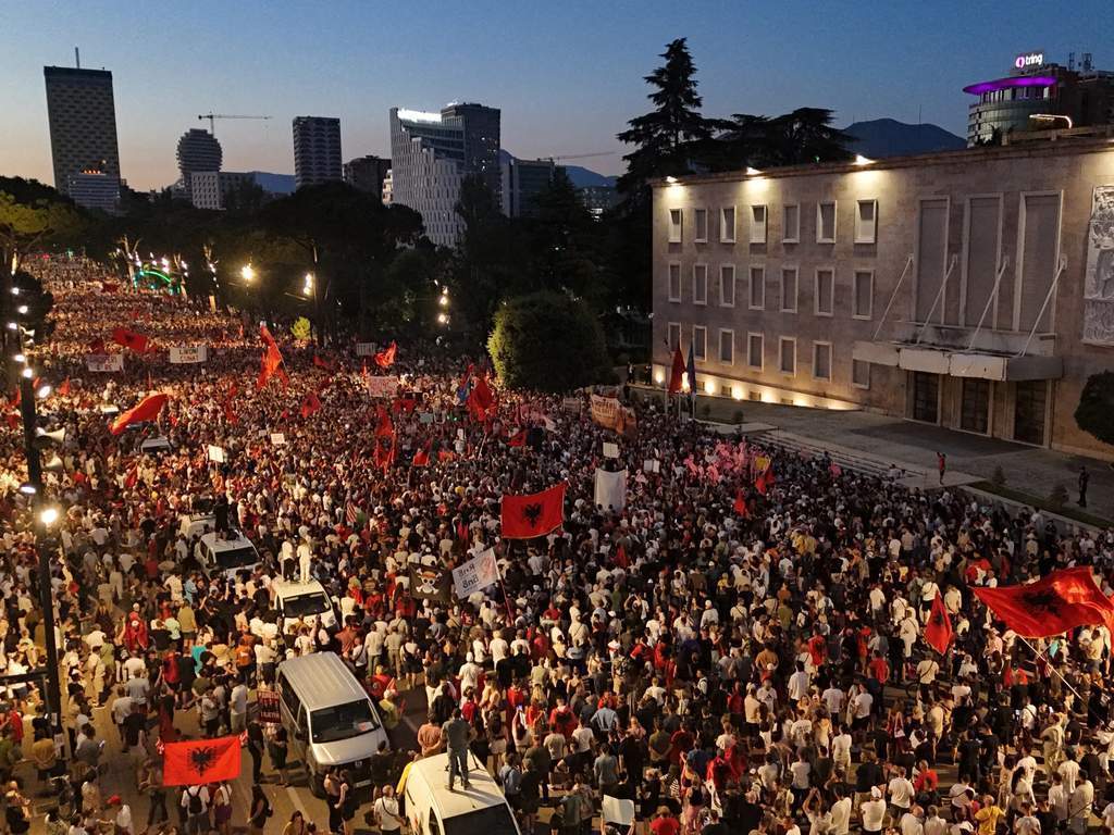 Protesters gather outside a Tirana court demanding the release of activists.