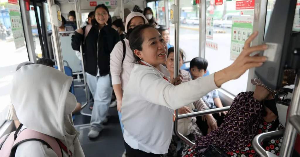 Passengers boarding a newly upgraded public bus in Ho Chi Minh City
