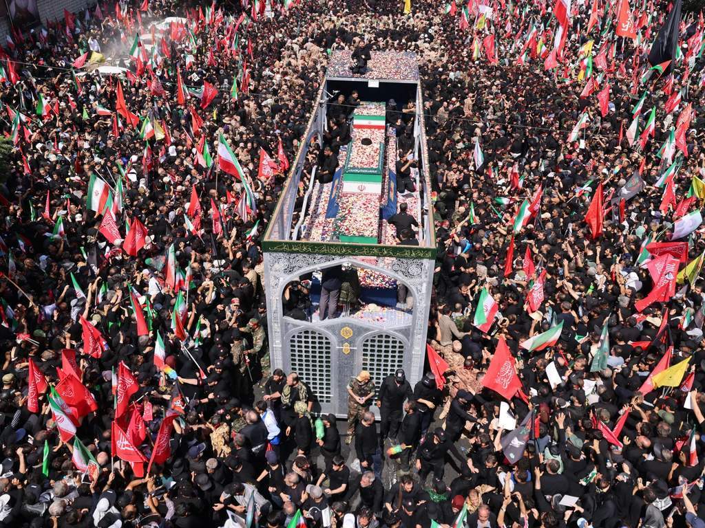 Massive crowds gather in Tehran for Khamenei's funeral procession.