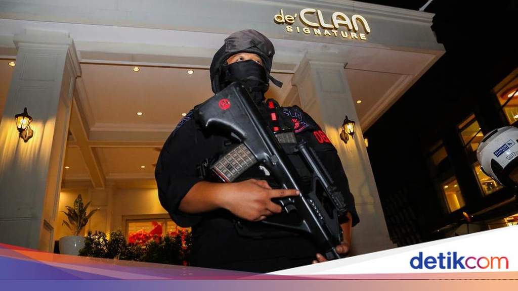Police investigators conducting corruption raids at a location in South Jakarta
