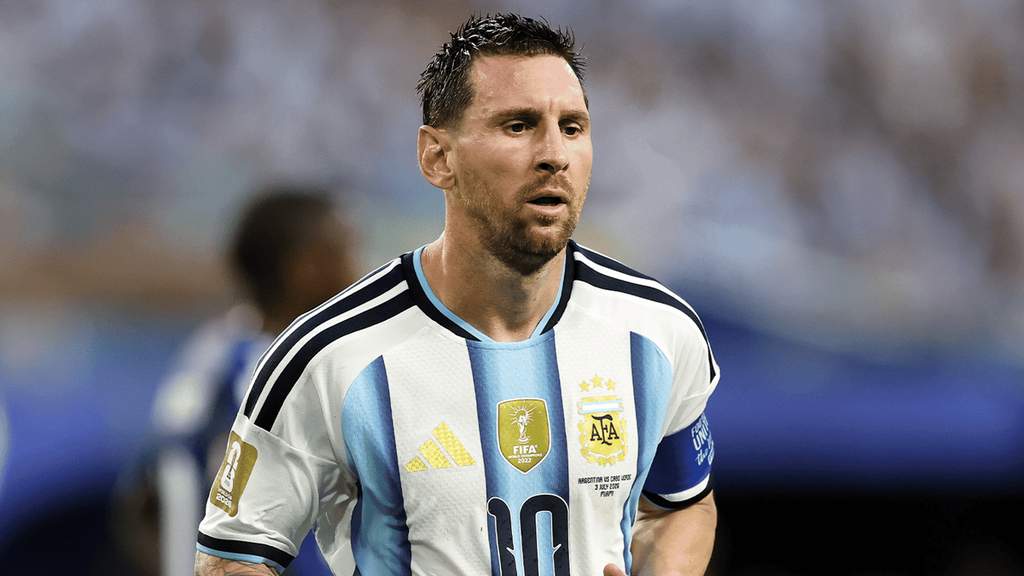 Lionel Messi walks on the pitch during a World Cup match for Argentina