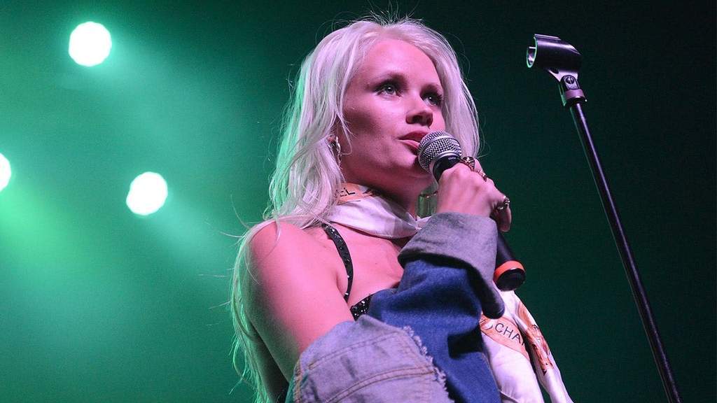 Singer Lauren Bennett of the American girl group G.R.L. posing at an event