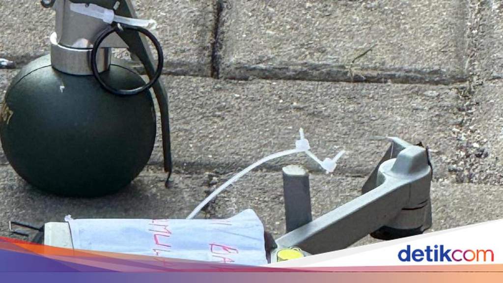 A drone carrying a replica grenade lands at a lawyer's residence in Depok, West Java