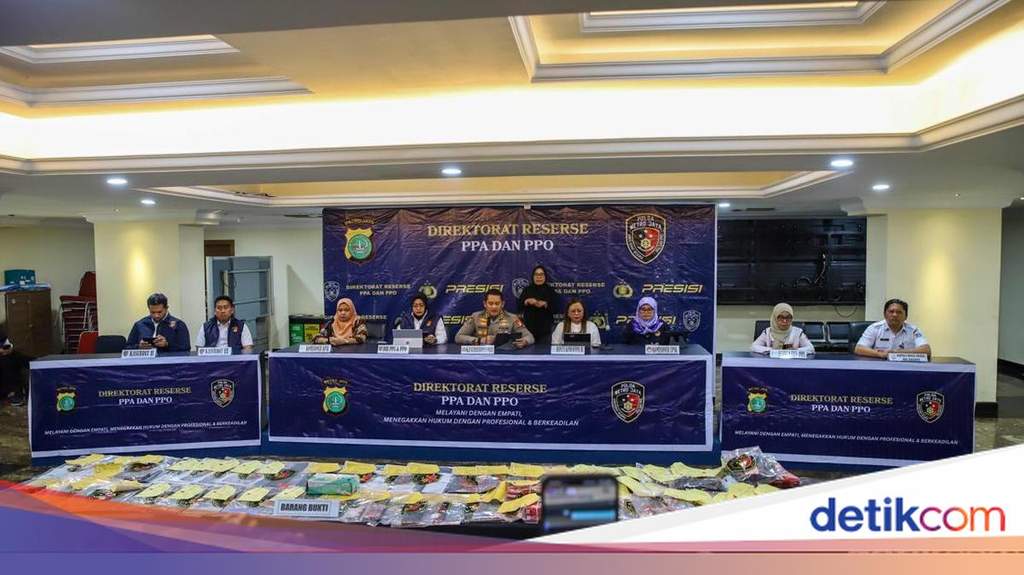 Polda Metro Jaya officials hold a press conference regarding the child exploitation case in Bekasi