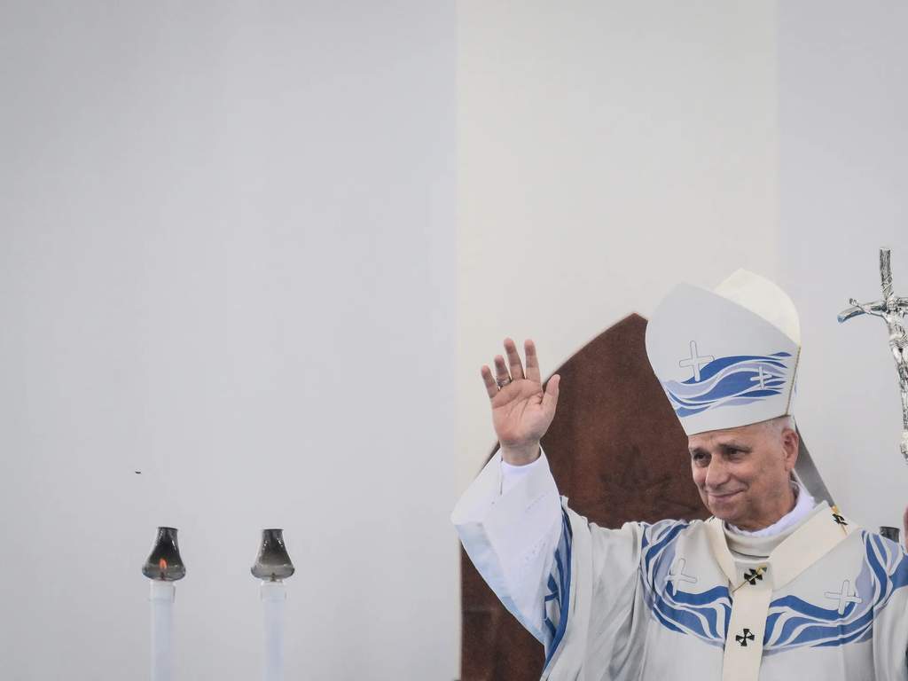 Pope Leo XIV honors fallen migrants at the Lampedusa frontier.