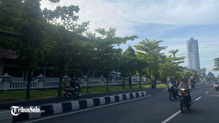 The clear and partly cloudy sky over the city of Solo during a hot dry day