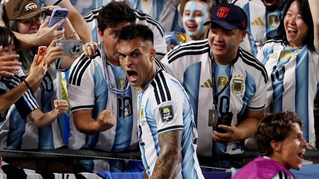 Lautaro Martinez celebrating with Argentina fans after scoring against Switzerland