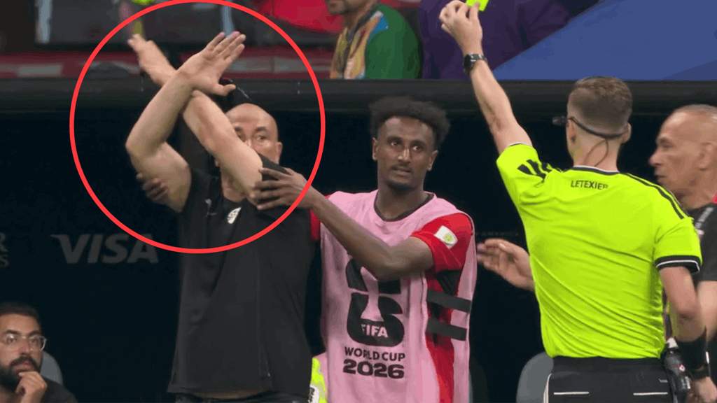 Egypt manager Hossam Hassan gestures during the World Cup match against Argentina